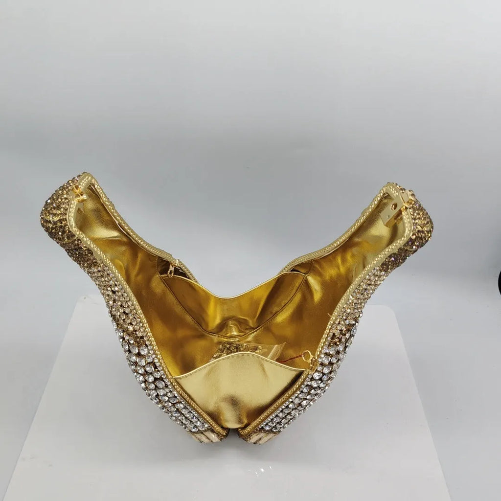 Gold hard alloy evening clutch shaped like a champagne bottle with synthetic leather lining