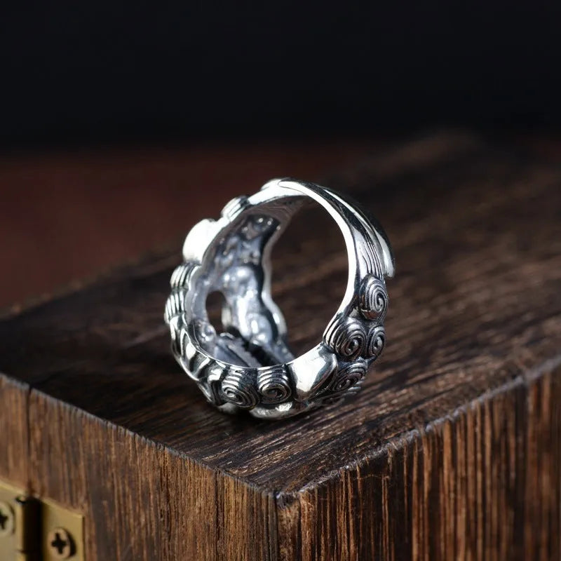 Silver open-style ring with a domineering engraved zodiac animal Jibeast pattern.