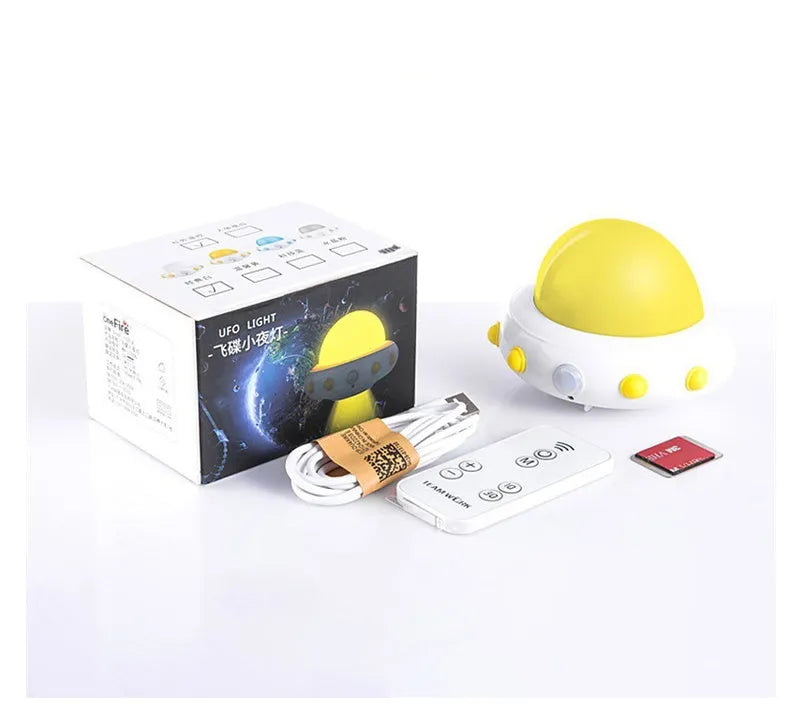 Remote control UFO-shaped bedside night light in blue, pink, or white with LED lighting