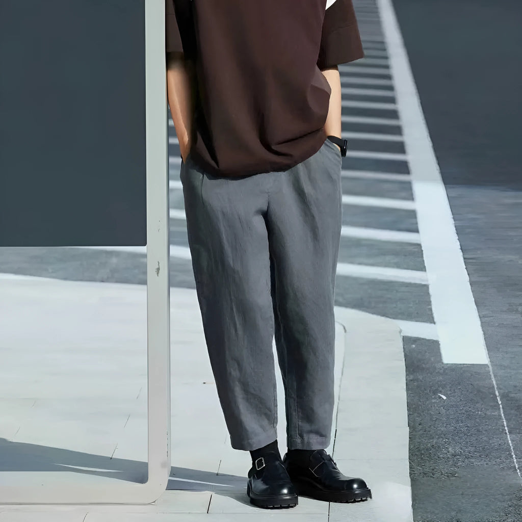 Men's loose straight-leg casual summer pants in beige colour with a drawstring waist.