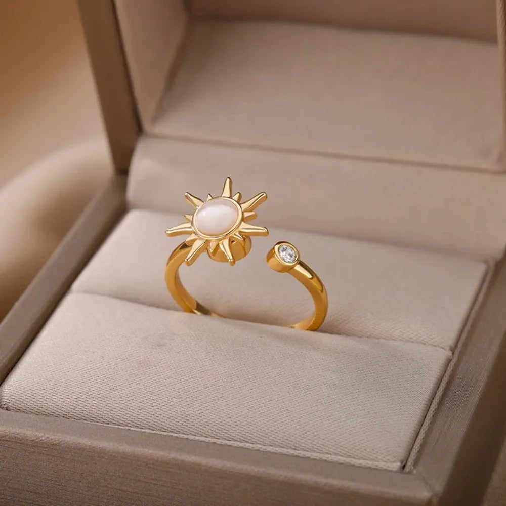 Gold and platinum rotatable decompression ring with adjustable opening and geometric round design