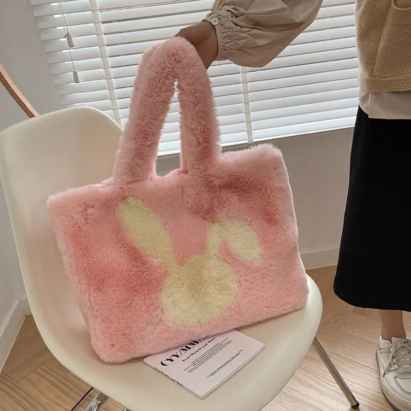 Plush rabbit ears shoulder tote bag in solid colour with cartoon design