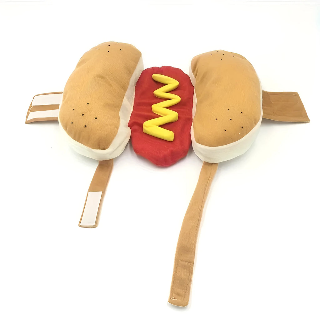 A dog wearing a plush hot dog costume with a back hook and loop closure.