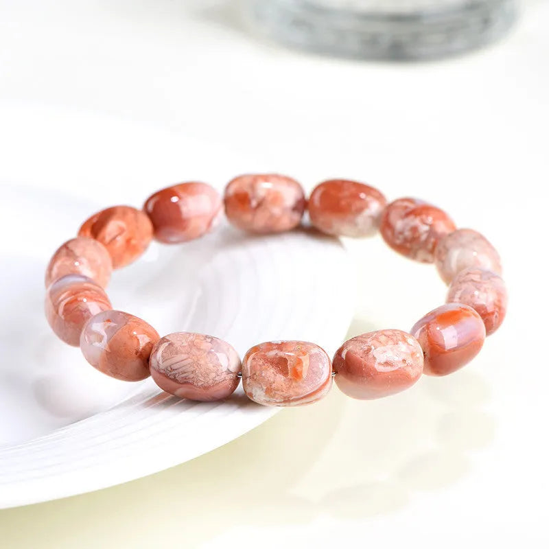 Natural cherry agate barrel bead bracelet with geometric beads and Ruyi charm