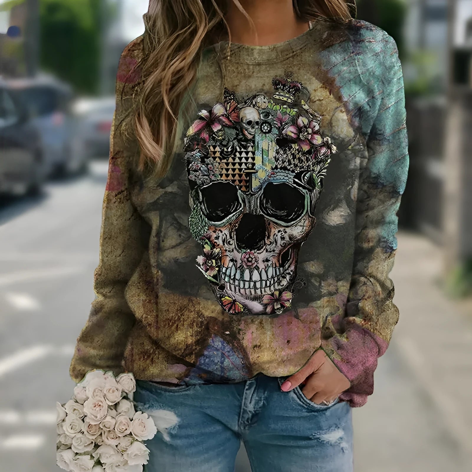 Black long sleeve sweatshirt with skull graphic print, showing front view of casual streetwear garment