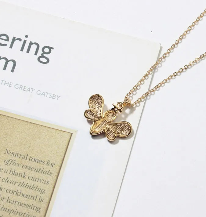 Cartoon bee drop pendant necklace on alloy cross chain for women, available in coffee, yellow, red colours