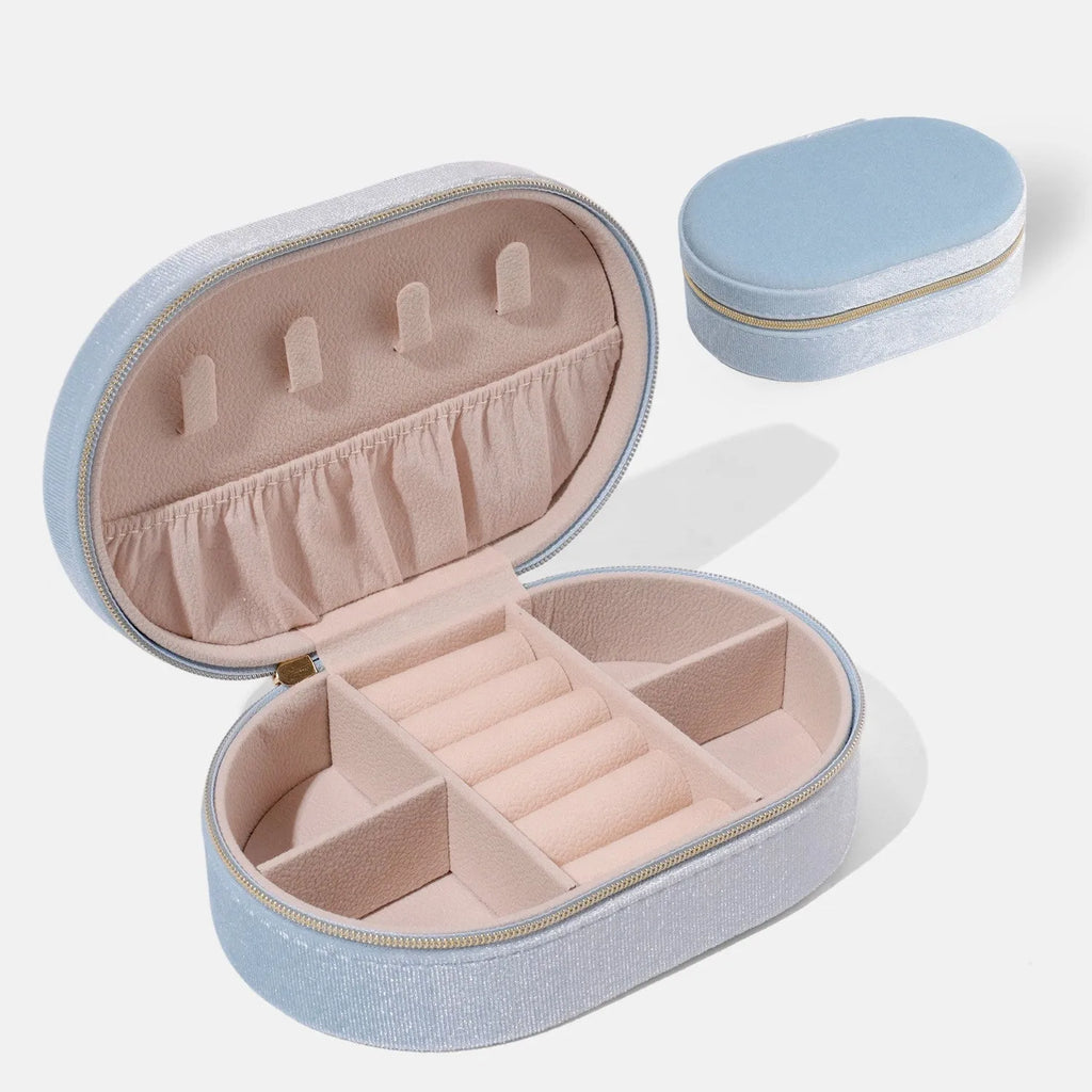 Oval velvet jewellery storage box with soft flannel interior in multiple colour options.