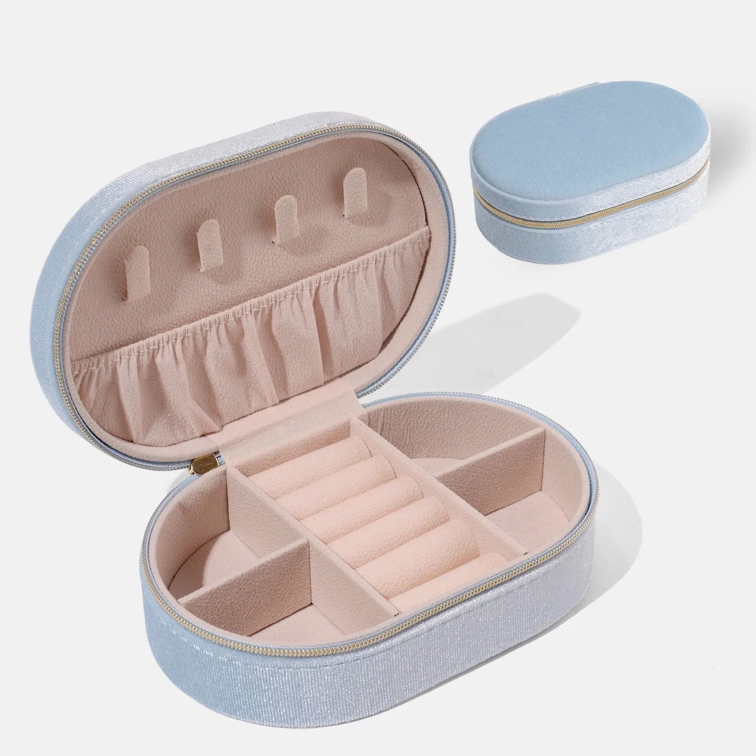 Oval velvet jewellery storage box with soft flannel interior in multiple colour options.