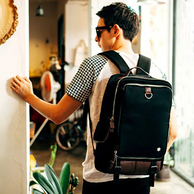 Large Oxford cloth backpack for men in multiple colours, showing dimensions of 30cm wide by 46cm high.