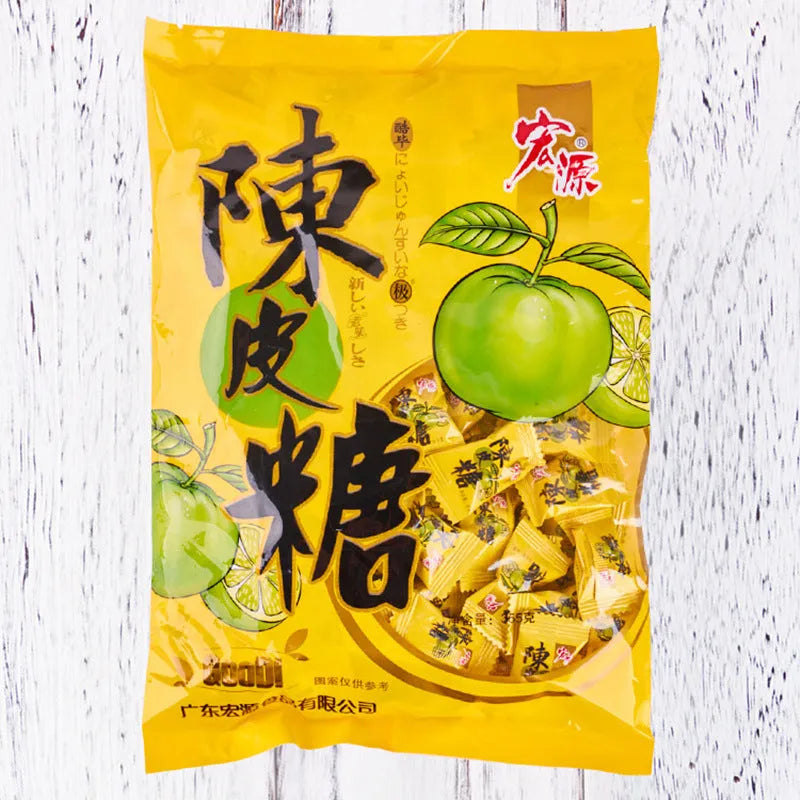 Assorted Chinese fruit flavoured hard candies: guava, plum sugar, and tangerine peel in separate bags.