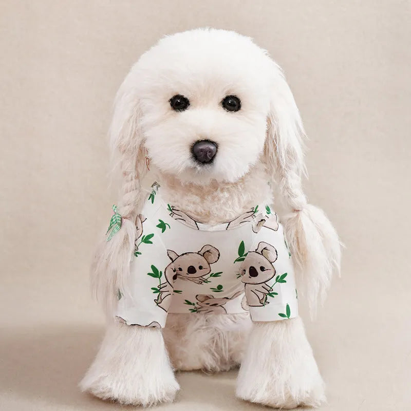 Printed polyester dog t-shirt for small dogs showing colour patterns and size options with weight guidance