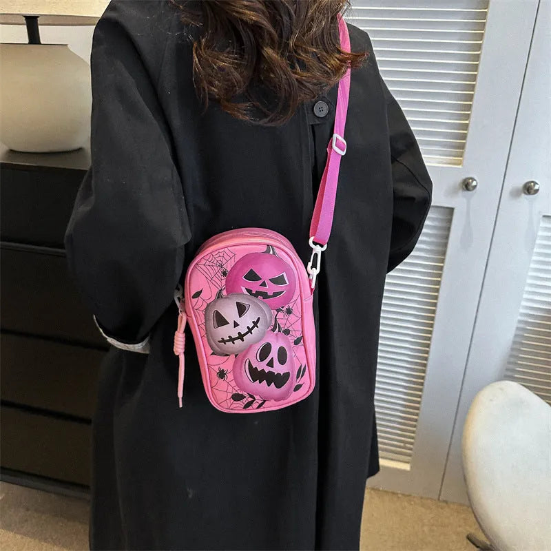 Halloween graffiti crossbody phone bag with pumpkin ghost bat print in medium size