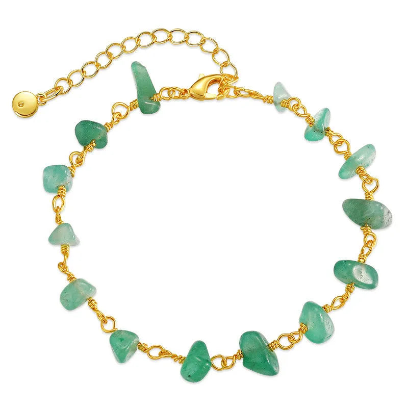 Women's irregular gravel texture bracelet with geometric styling and turquoise crystal accents on wrist