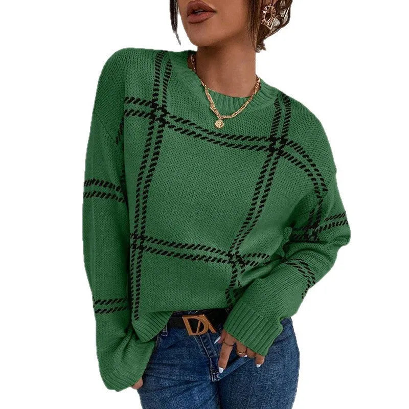 Women's loose-fit plaid colour-block acrylic sweater in apricot, black, beige, red, and green stripes.