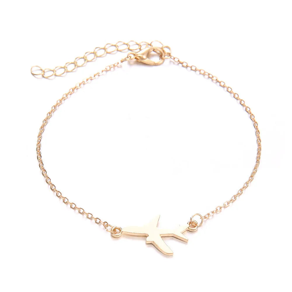 Set of three women's alloy bracelets with heart-shaped aircraft map charms.