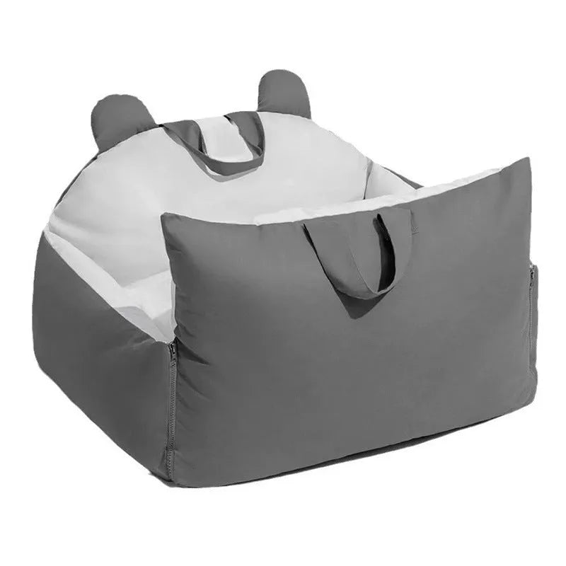Removable washable car dog kennel in beige colour, shown in a vehicle boot.