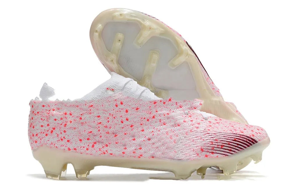 Men's low-top waterproof knitted football shoes with FG studs on a rubber outsole