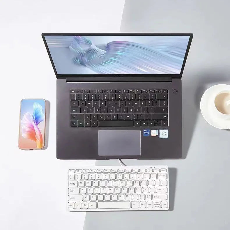 Wired USB mini keyboard in four colour options showing compact design and 1.3m cable