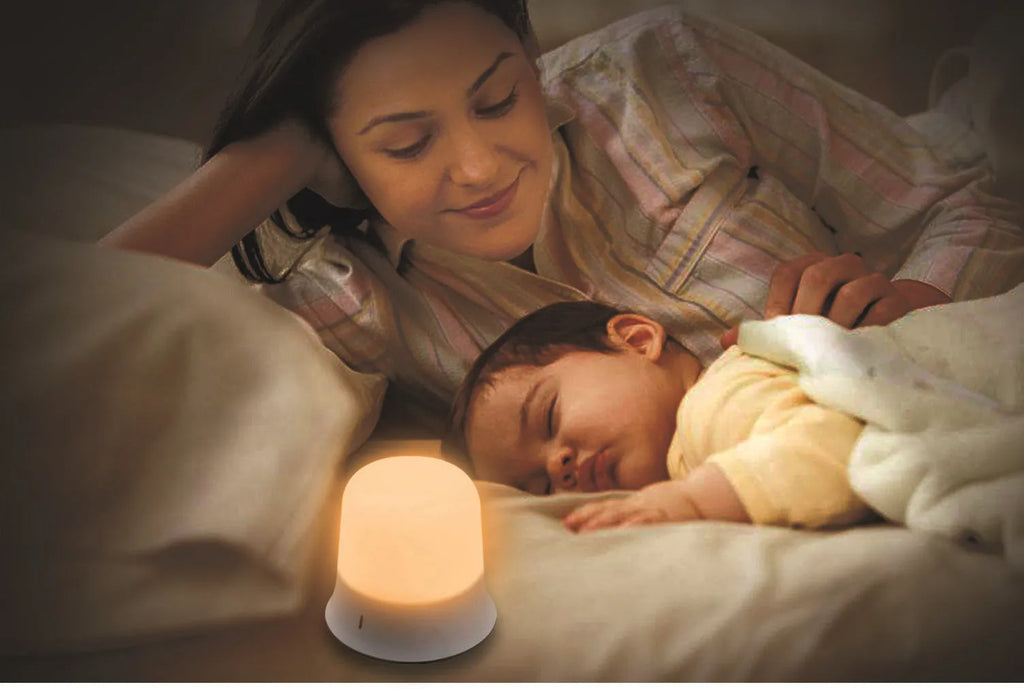 White bedside touch night light showing dimming control and colour change features