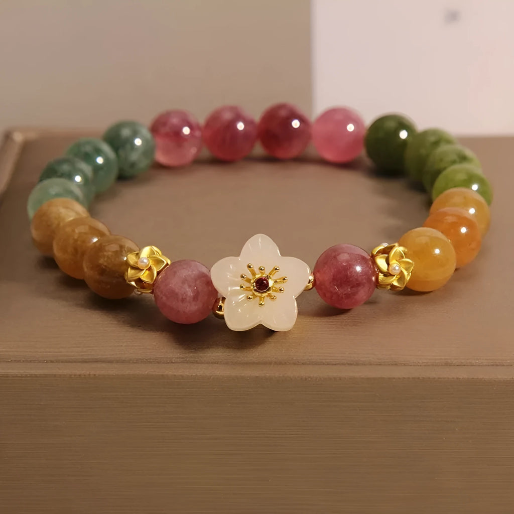 Natural colour tourmaline bracelet with geometric design showing floral or Chinese Fu character options