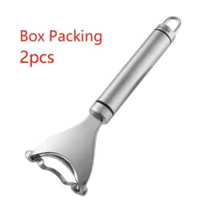 Stainless steel corn planer with silver finish on a kitchen surface measuring 18cm long