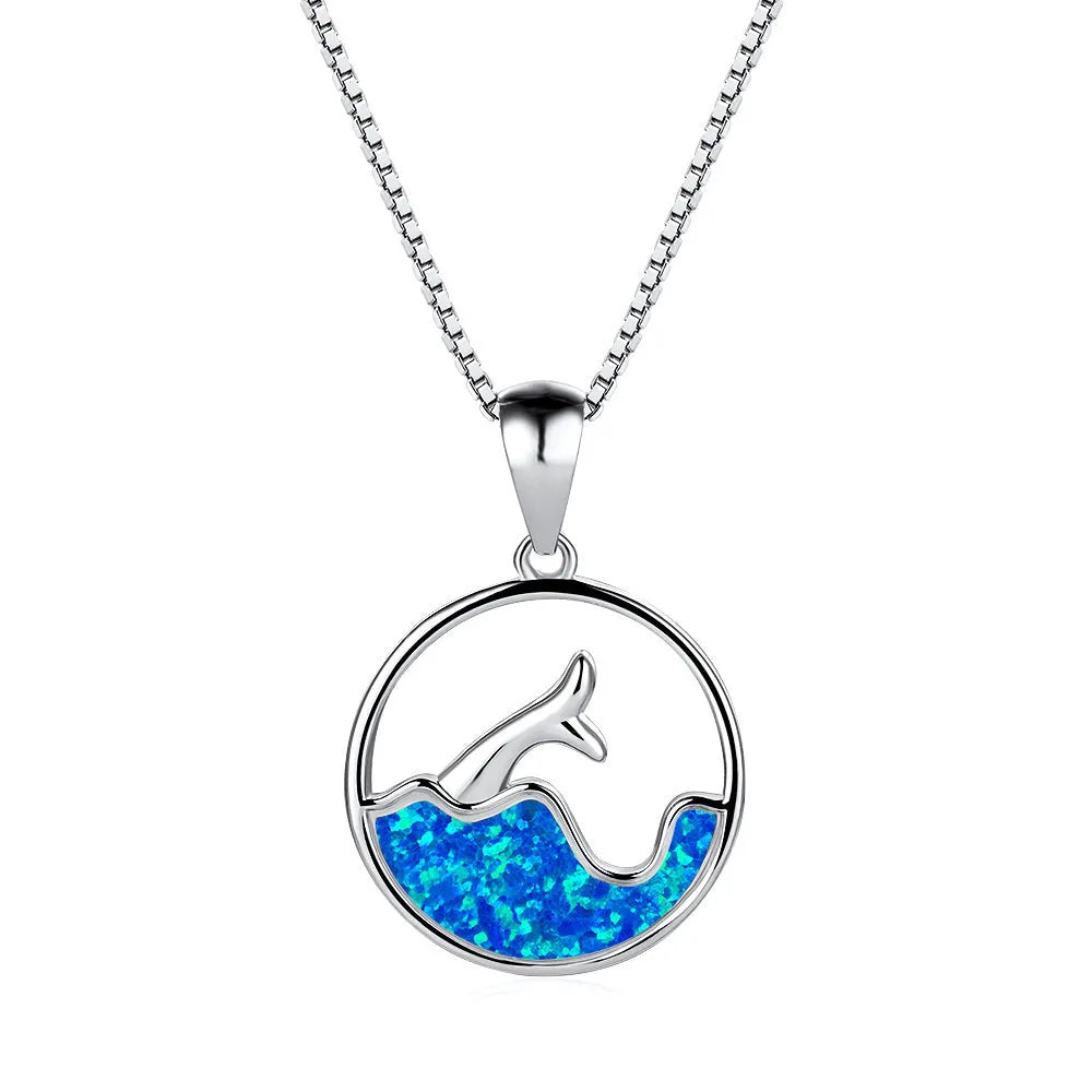 Geometric fishtail pendant necklace with electroplated white gold finish and round decorative elements