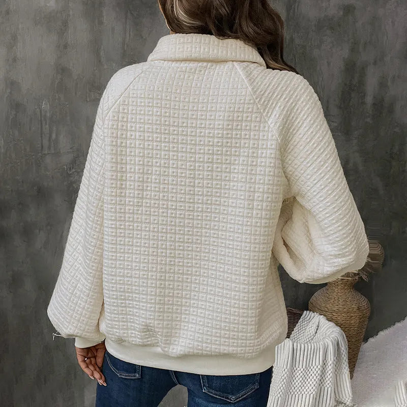 Women's milky white polo collar sweater with long sleeves and a solid colour texture.