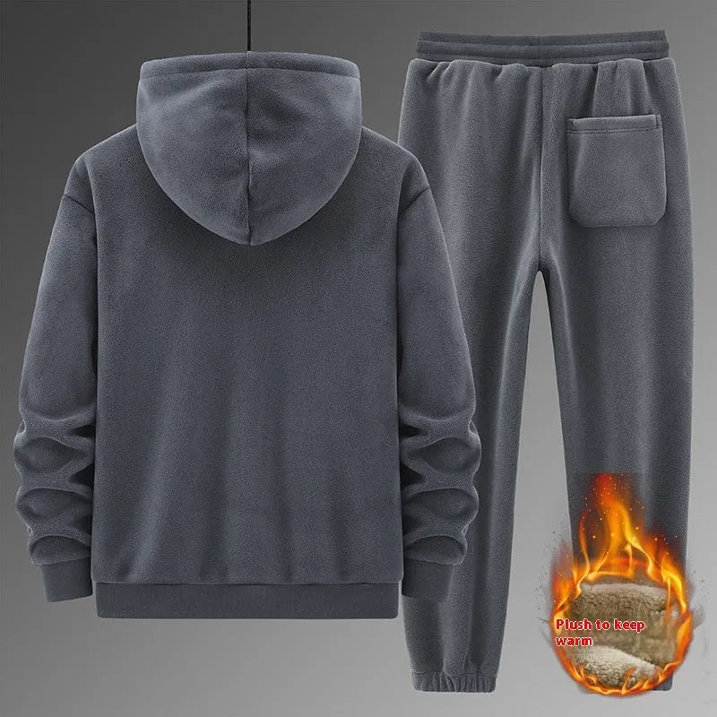 Grey cashmere hooded sweater and cotton pants casual sports suit set laid flat.