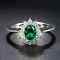 Women's floral copper ring with zirconium stones in green, blue, or red on a size 6-10 finger.