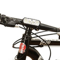 Black bicycle headlight with 350 lumen output and rechargeable battery mounted on handlebars