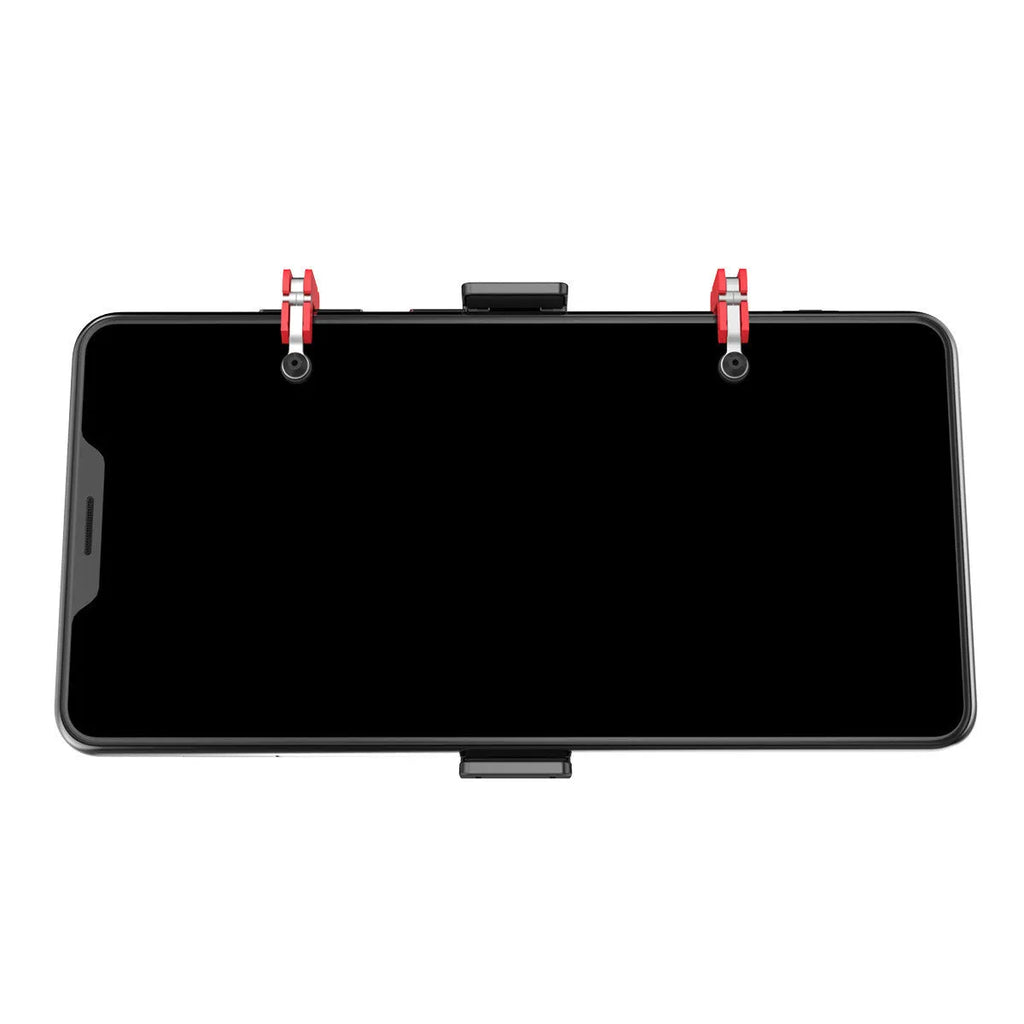 Black PG-9137 mobile game trigger with metal button and telescopic clip attached to a smartphone
