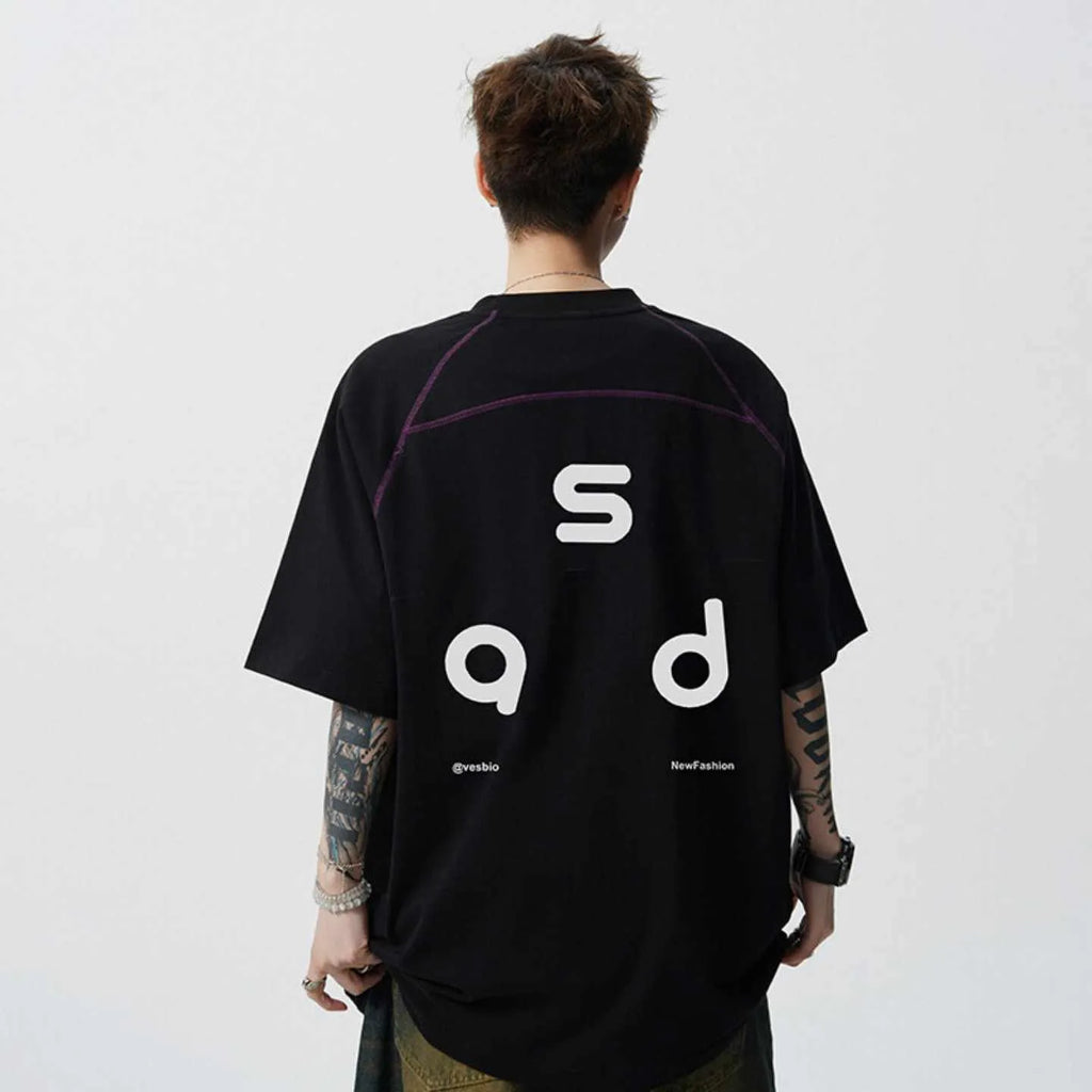 Man's loose fit black cotton T-shirt with large white letter print on the front.