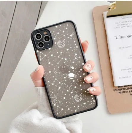 Black and white iPhone cases with soft touch surface showing raised edge protection