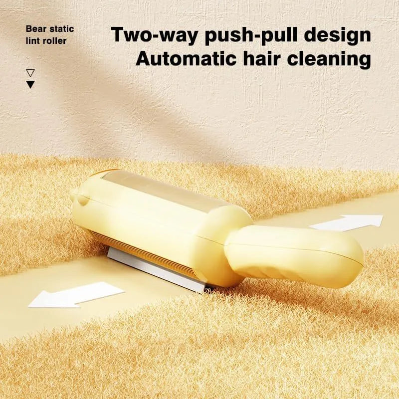 Blue reusable pet hair removal roller with a self-cleaning base on a fabric sofa.