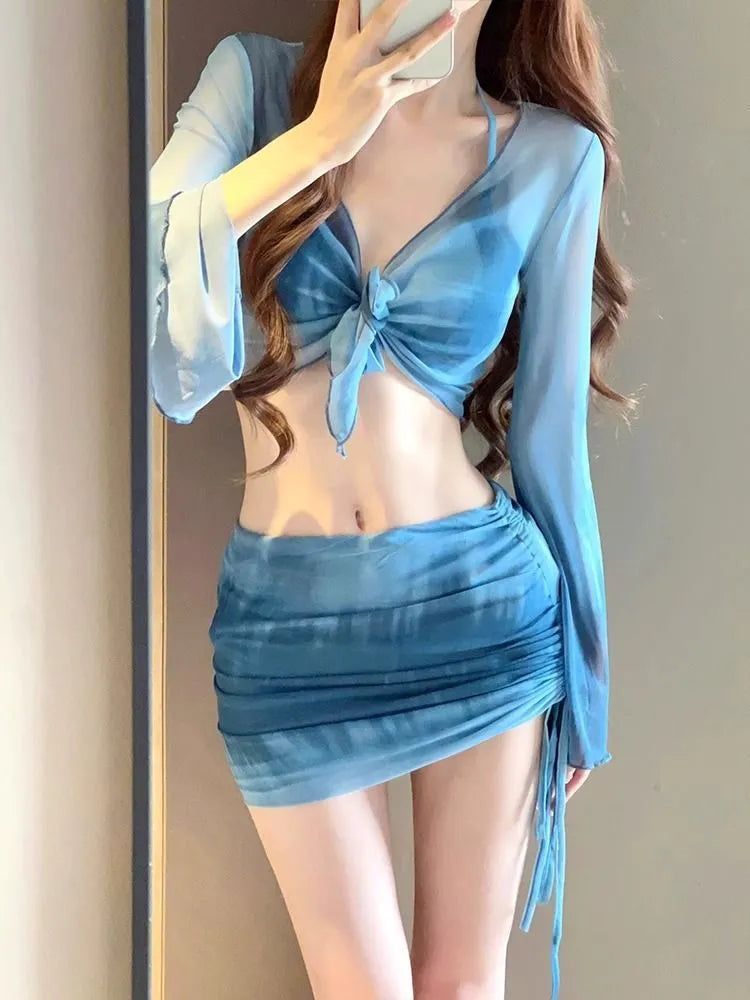 Women's blue high-waisted bikini four-piece set with shirt, bra, underwear and skirt for swimming