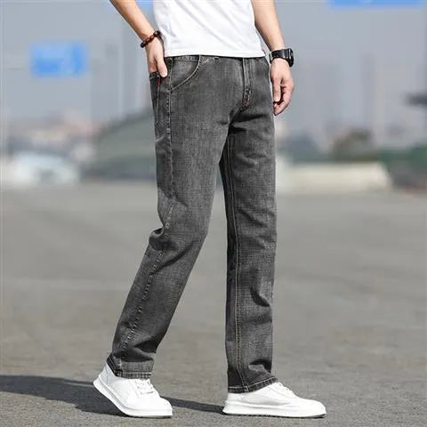 Men's smoky gray straight leg jeans with high elasticity rabbit fur fabric on low waist mannequin