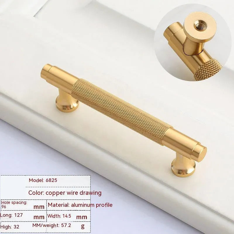 Brushed brass aluminium wardrobe handle in modern European style on a white background.