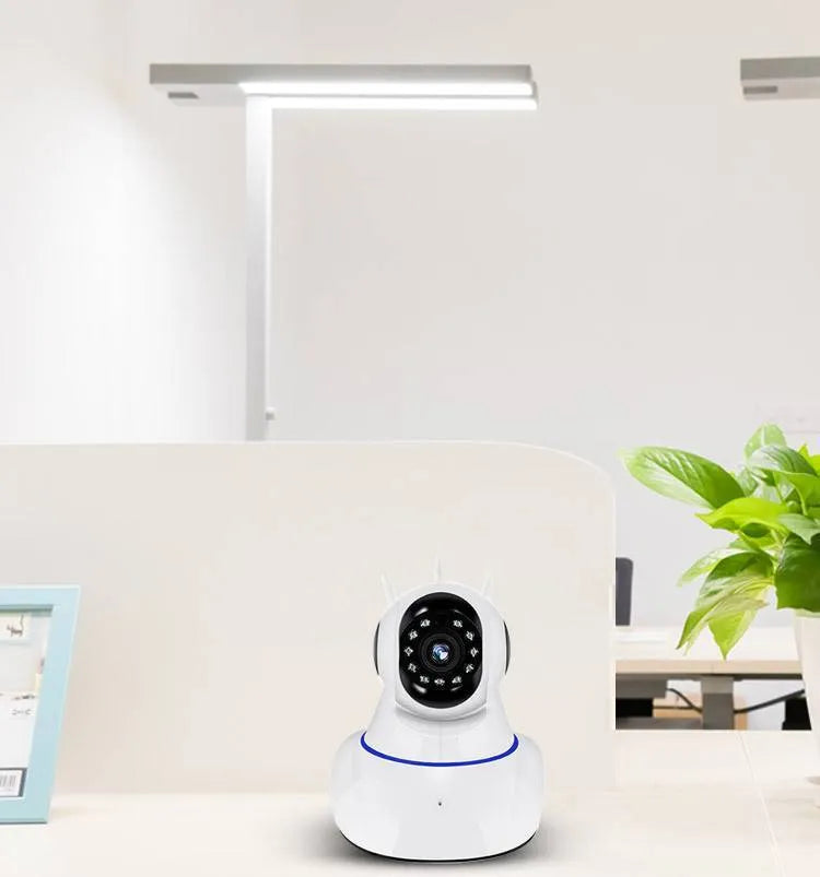 White wireless dome security camera for indoor and outdoor HD surveillance.
