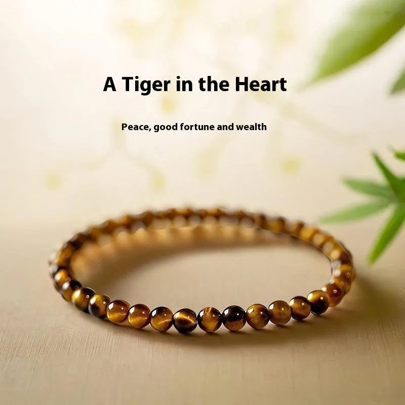 Handcrafted tigereye bracelet in new Chinese style with geometric round elements, shown in 4mm, 6mm, and 8mm bead sizes.