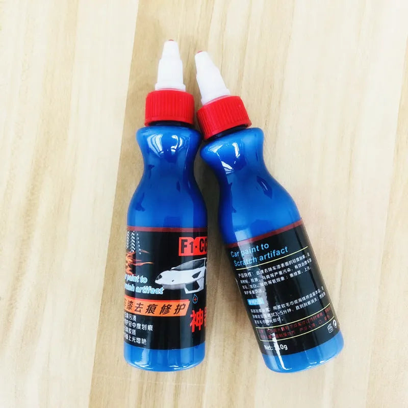 Small blue car wiping tool and 60ml bottle of blue scratch repair agent for vehicles.