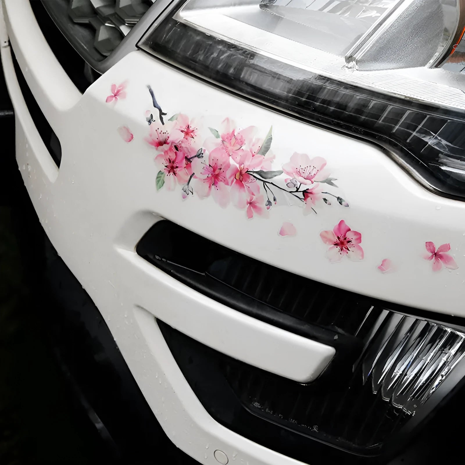 Cherry blossom flower pattern car sticker on vehicle, showing small and large size options.