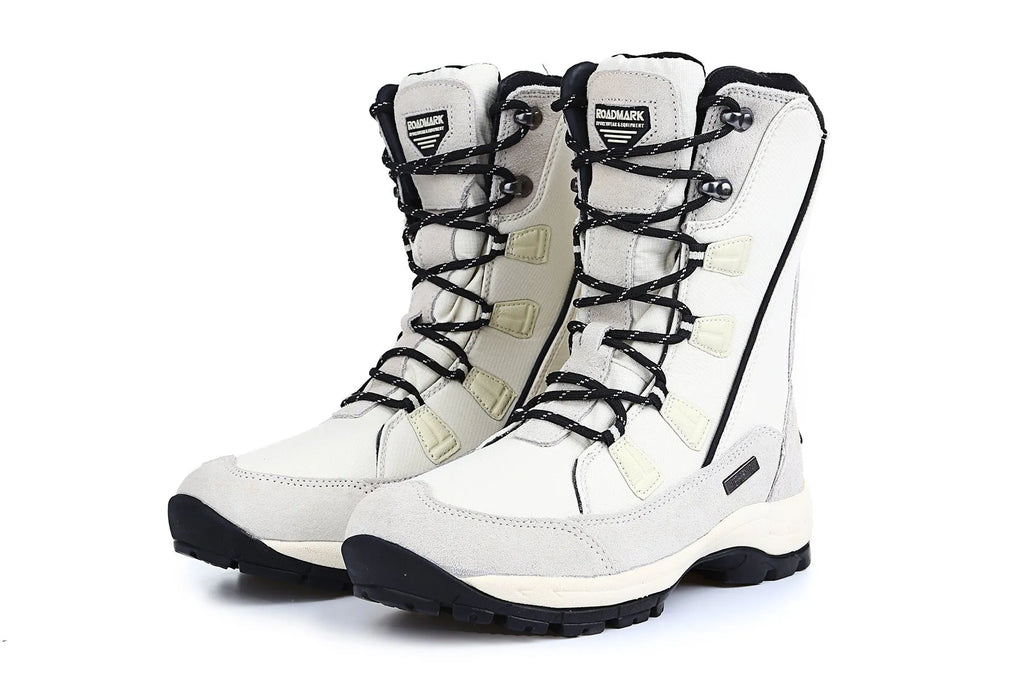 Women's mid-calf thermal snow boot in black with a round toe, genuine leather upper, and rubber sole.