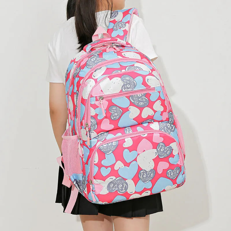 Blue student backpack with air pillow belt system showing large capacity interior
