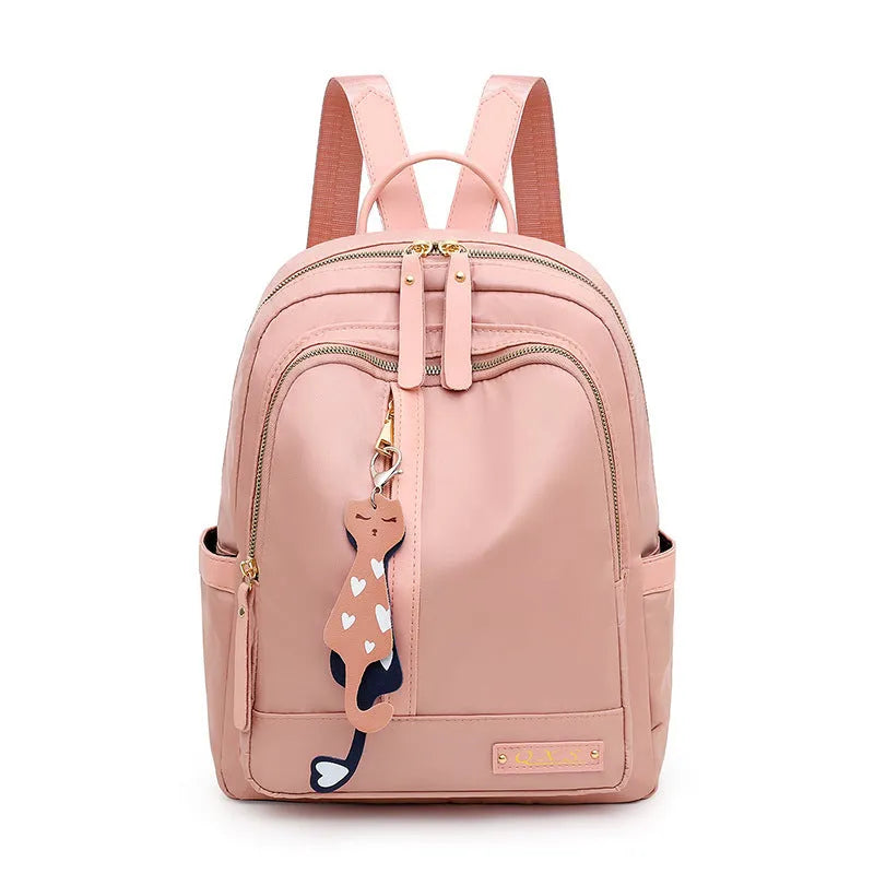Black or pink casual nylon backpack with waterproof features and organised internal compartments