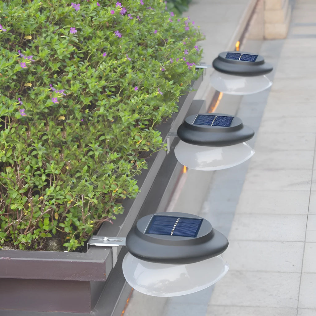 Solar-powered outdoor fence wall lamp in black or white shell with LED illumination for garden decoration