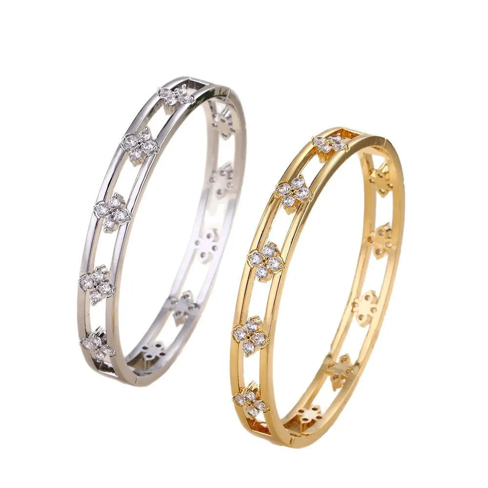 Gold and silver hollow women's bracelets with four-leaf clover charms and zircon stones.