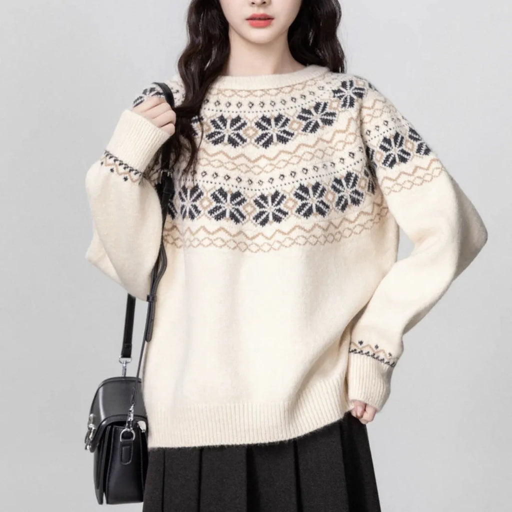 Milky white women's Fair Isle patterned knit sweater with loose fit and crew neck.