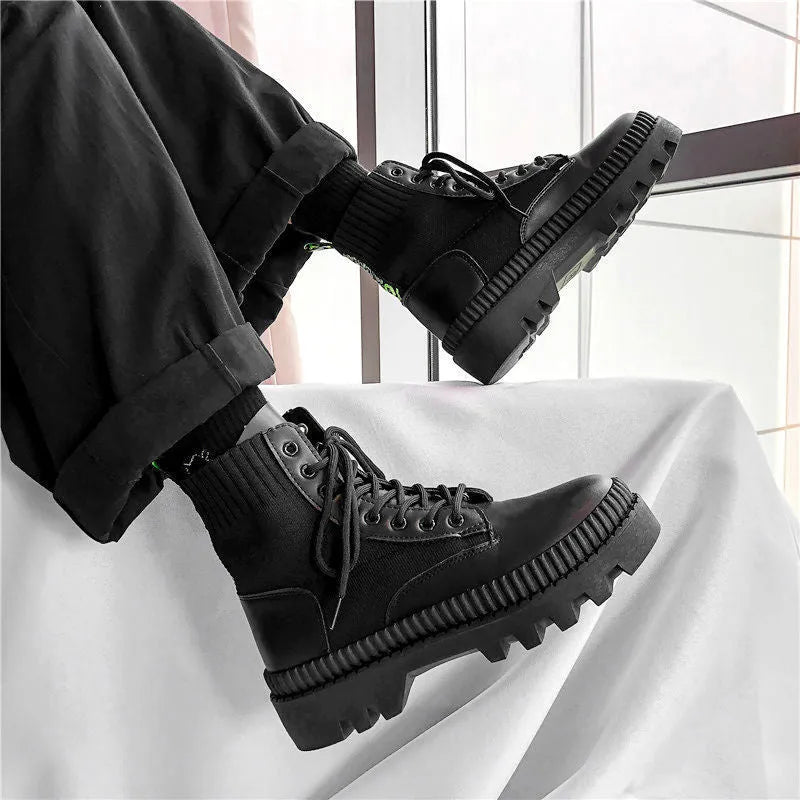 Men's black platform Dr Martens boots with 8 eyelets and a side zipper on a frosted cowhide upper.