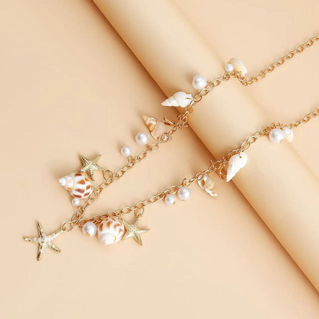 Women's alloy waist chain and matching bracelet set with star charms for summer beach wear