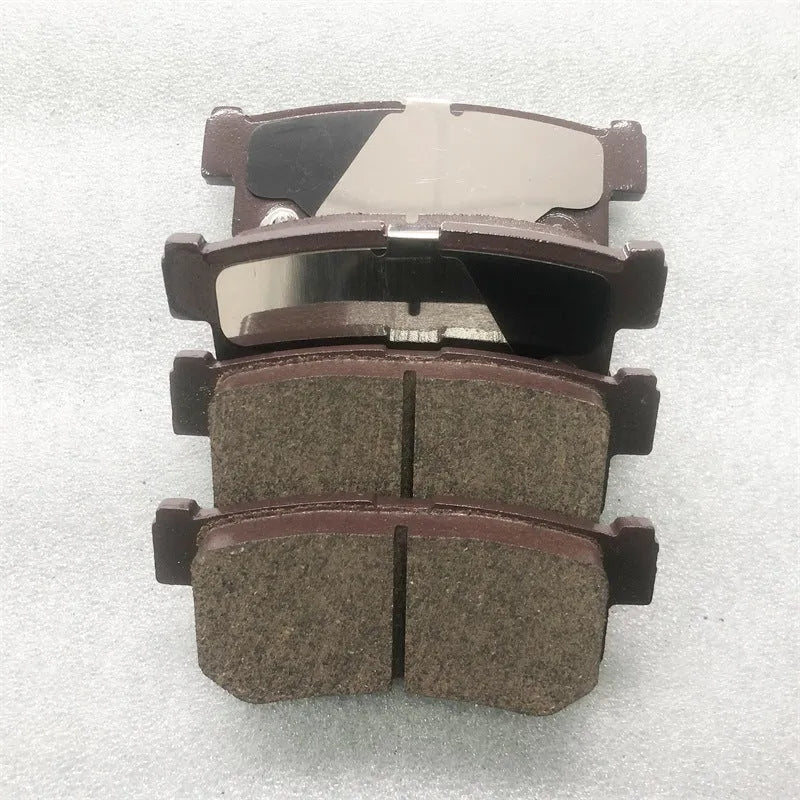 48413090A1 brake pad component for SsangYong Actyon, Korando, Rexton, and Rodius vehicles.
